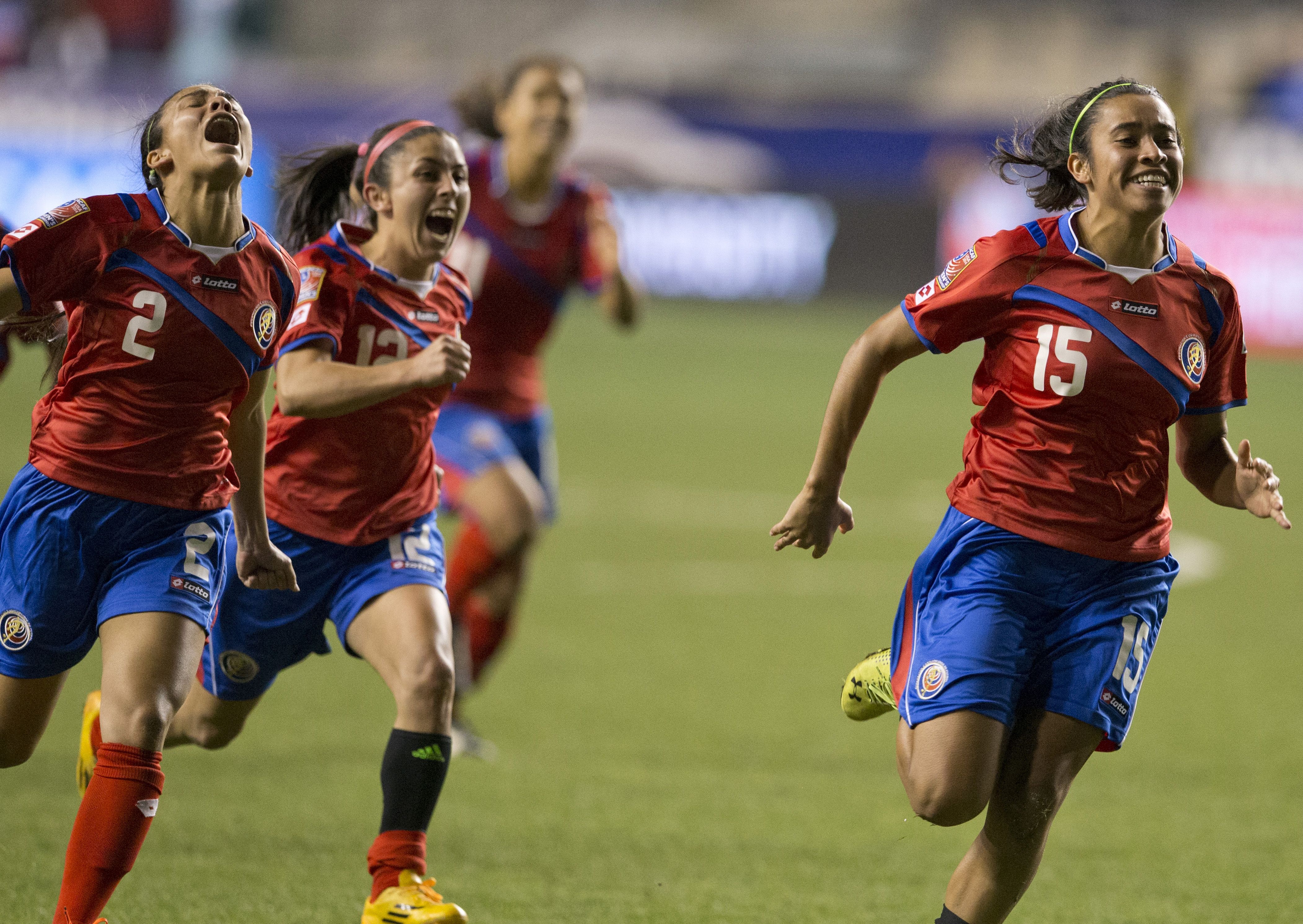 CHESTER, PA - OCTOBER 24: Lixy Rodriguez #12, Gabriela Guillen #2, Cristin Granados #15 of Costa Rica react after defeating Trinidad & Tobago in a shoot out in the  2014 CONCACAF Women's Championship semifinal game on October 24, 2014 at PPL Park in Chester, Pennsylvania. (Photo by Mitchell Leff/Getty Images)  Costa Rica defeated Trinidad & Tobago in a shoot out 3-0