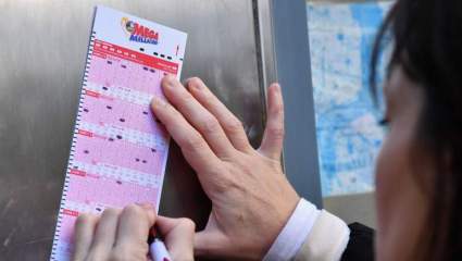 ¿Puede comprar un boleto de Mega Millions con una tarjeta de crédito o débito?